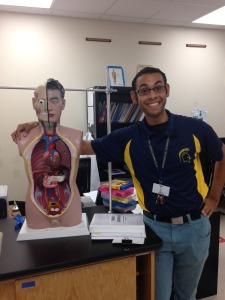 Mr. Klein posing with a model of the human body used for anatomy demonstrations. 
